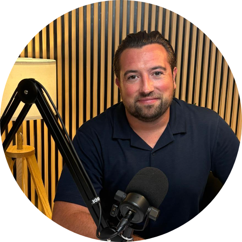 Greg Styan, co-founder of The Coach Trap, at the podcast mic